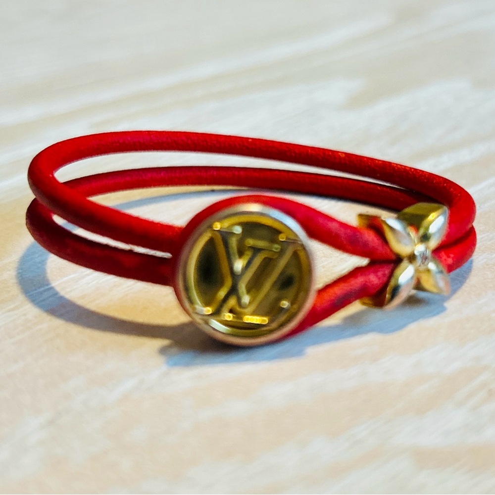 Red and Gold Bracelet with Dual Band Design